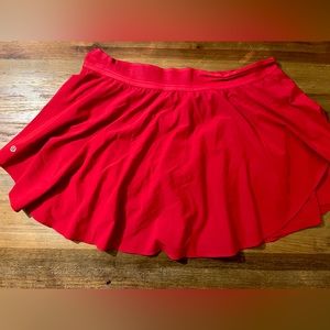 LULULEMON: court rival high rise skirt; size 14